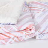 Printed plush to white sherpa two ply blanket