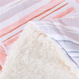 Printed plush to white sherpa two ply blanket